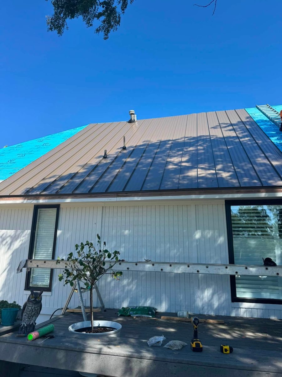 Fresh shingles and trim detail on a finished roof